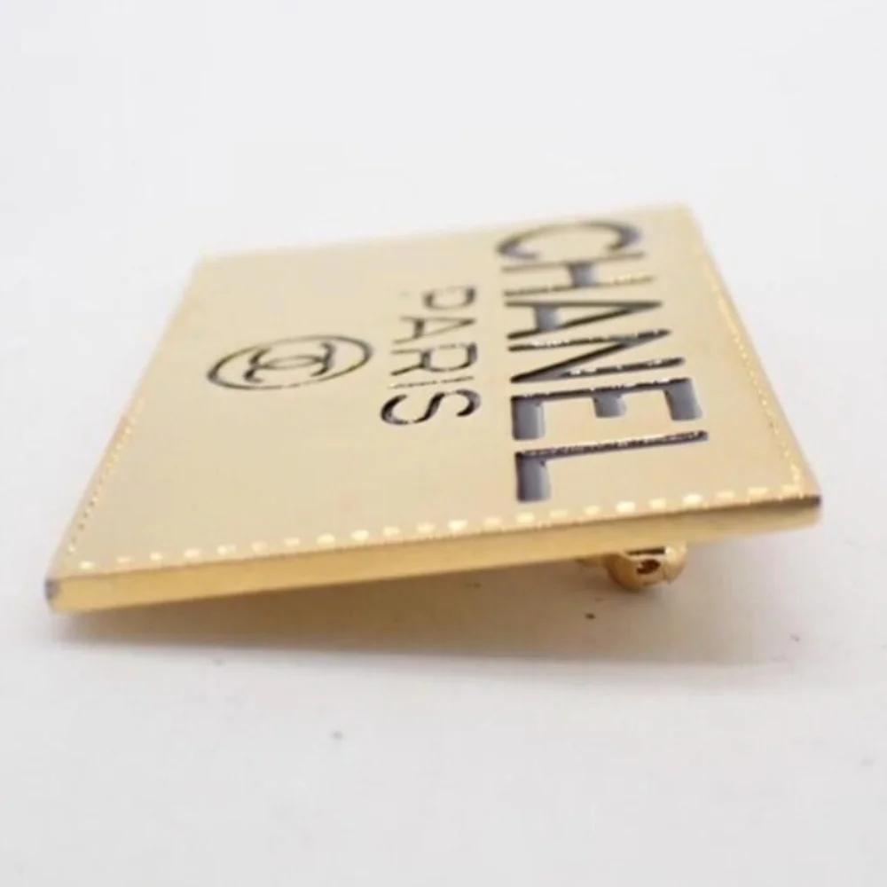 CHANEL Black and Gold Logo Brooch - Picture 5 of 6